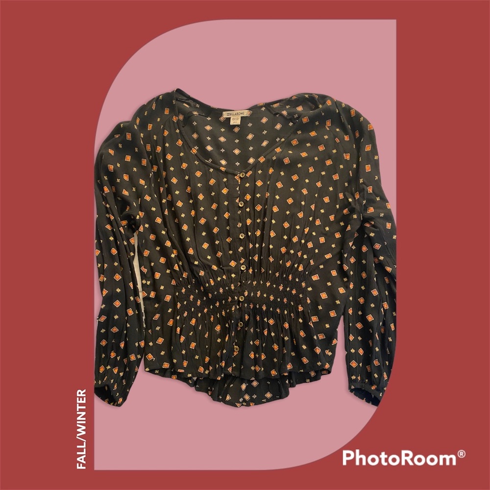 Billboard long sleeve women’s shirt with graphic pattern.